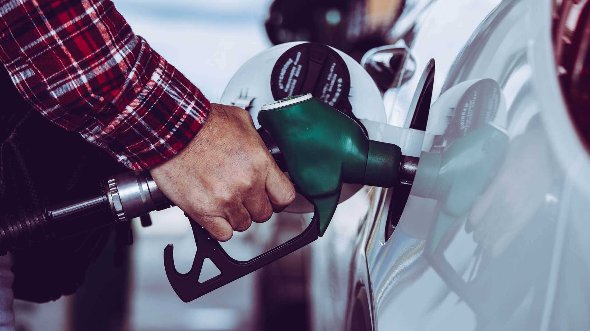 Person filling their car with petrol