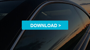 light blue download button in front of dark tinted car window 